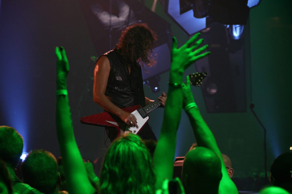 A photo of Metallica performing  on the Through the Never tour stage