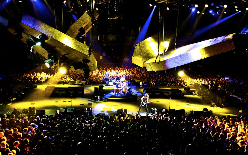 A photo of Metallica performing on the Death Magnetic tour stage