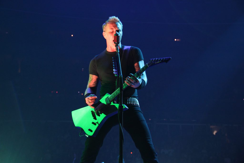 A photo of Metallica performing  on the Through the Never tour stage