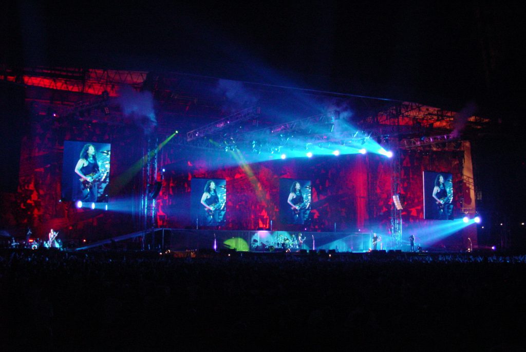 A photo of Metallica performing on the Summer Sanitarium tour
