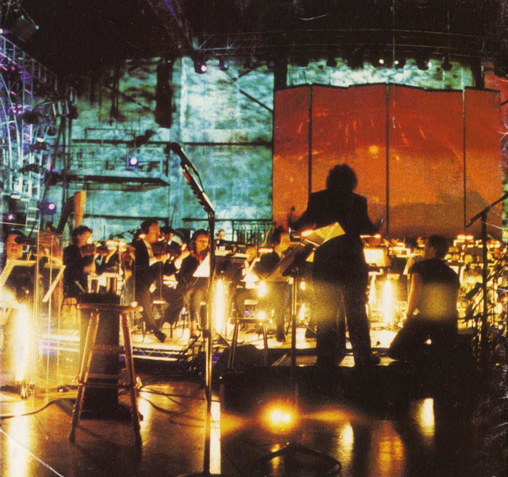 A photo of Metallica and The San Francisco Symphony Orchestra performing at the Berkeley Community Center Theater in 1999